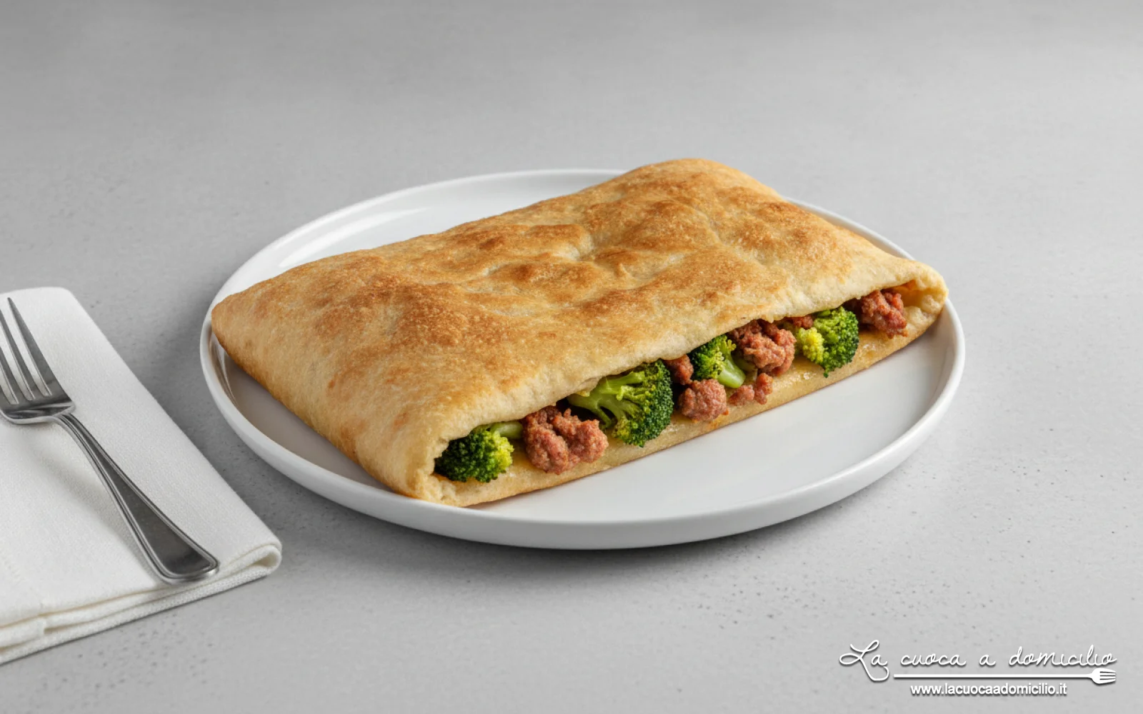 Scaccia ragusana con broccoli e salsiccia (Sicilia)